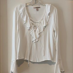 White top with bellflower sleeves